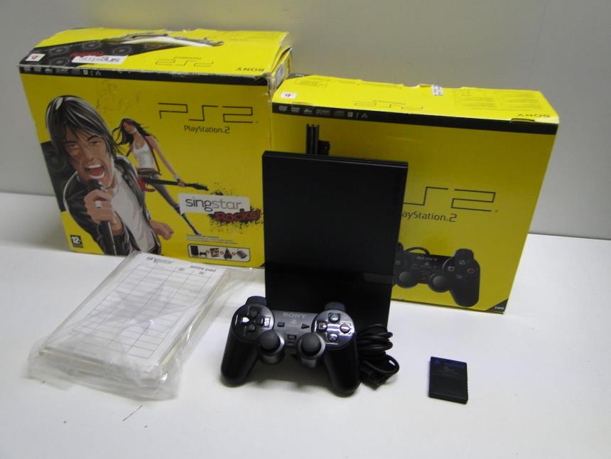 articulos_imagen1_163688.jpg PS2 CON MANDO MEMORY CARD Y CAJA