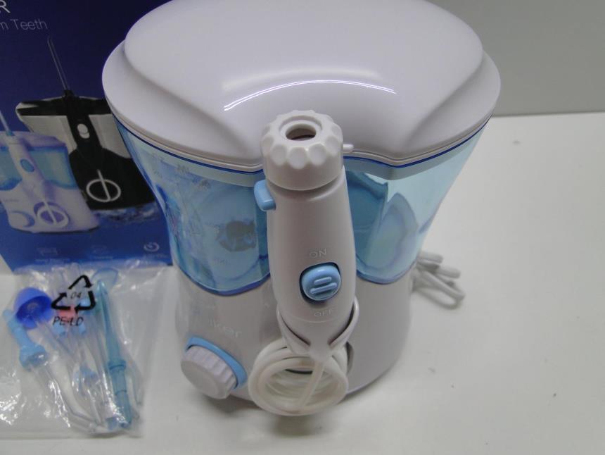 IRIGADOR DENTAL CON CAJA