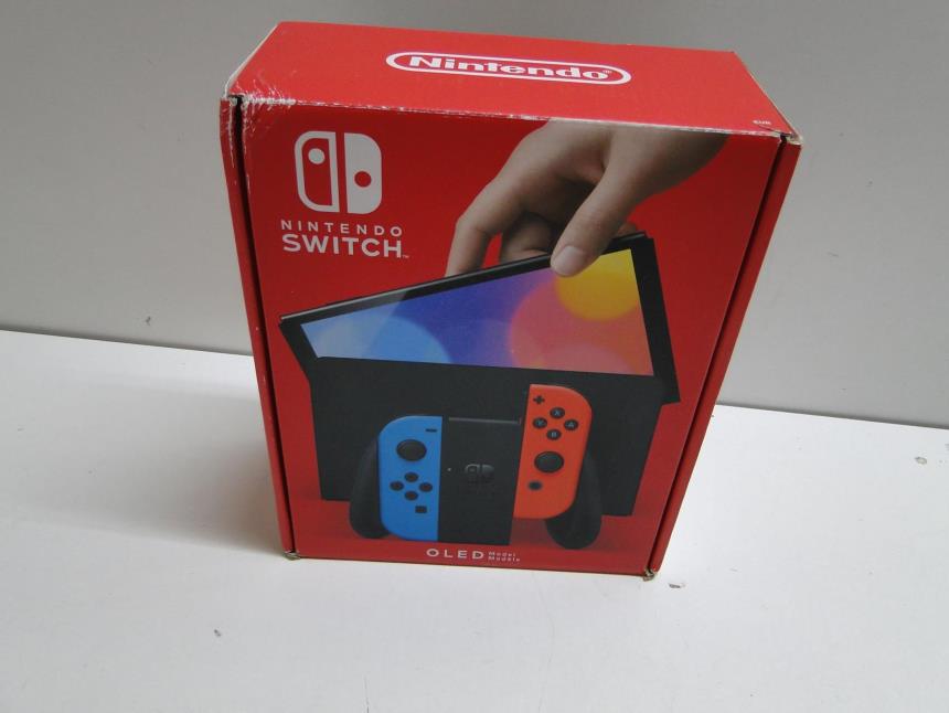 articulos_imagen1_170233.jpg NINTENDO SWITCH OLED CON CAJA PERFECTO ESTADO