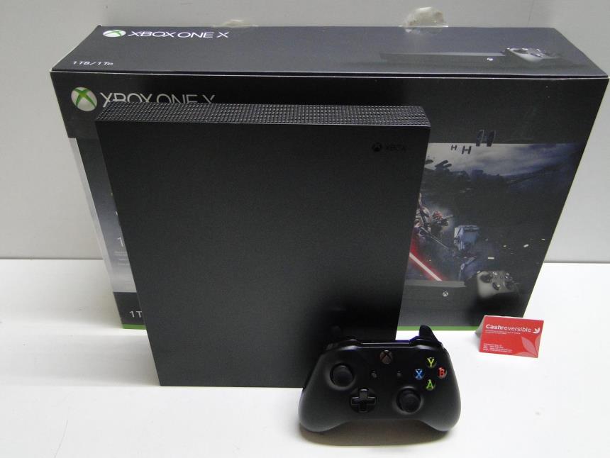 articulos_imagen1_173958.jpg XBOX ONE X CON CAJA Y MANDO