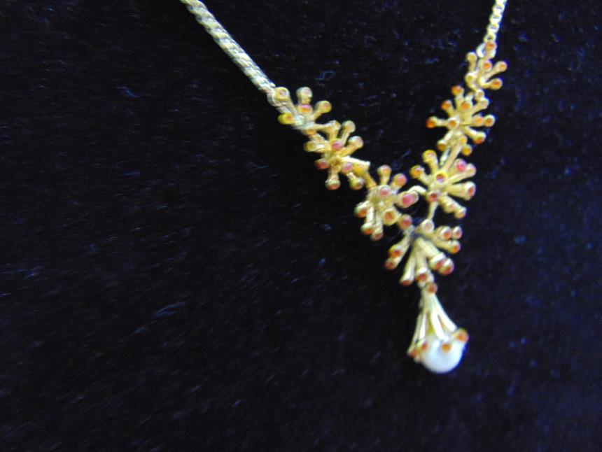 CADENA DE ORO DE18 K CON PIEDRAS