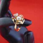 ANILLO DE ORO DE 18K CON PIEDRAS
