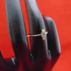 ANILLO DE ORO DE 18 K CON PIEDRAS