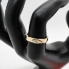 ANILLO DE ORO DE 18 K CON UNA PIEDRA