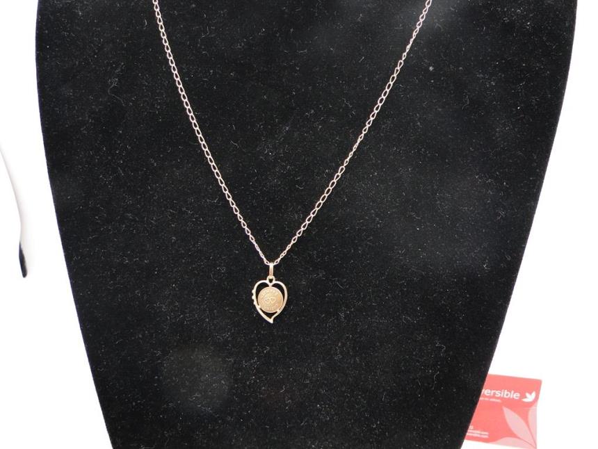 CADENA CON COLGANTE 18K