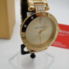 RELOJ DE DISEÑO CON CAJA PERFECTO ESTADO