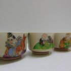 JUEGO DE 7 VASOS DE PORCELANA