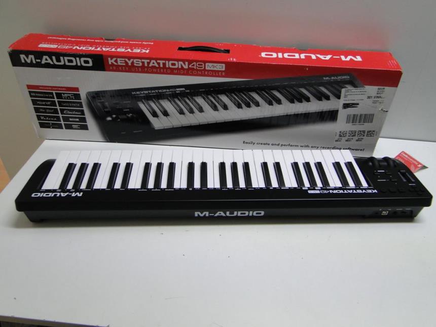 TECLADO MIDI 49 TECLAS CON CAJA