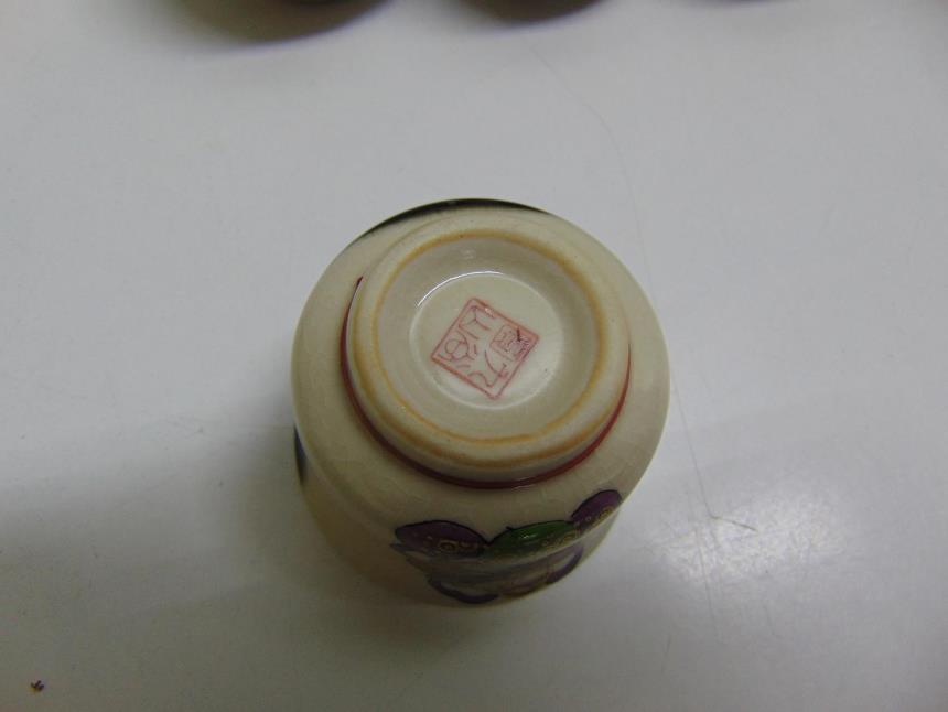 JUEGO DE 7 VASOS DE PORCELANA