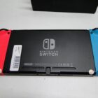 NINTENDO SWITCH CON BASE 2 JUEGOS Y FUNDA