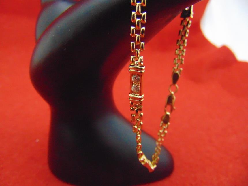 PULSERA DE ORO DE 18K CON PIEDRAS