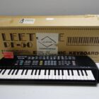 TECLADO MUSICAL CON CAJA