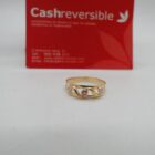 ANILLO DE ORO 18K CON PIEDRAS