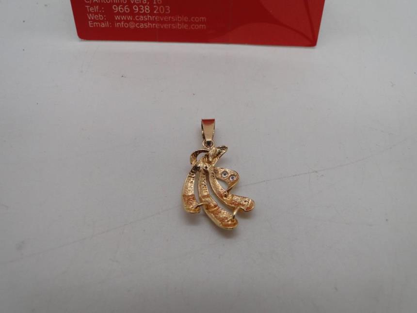 COLGANTE DE ORO 18K CON PIEDRAS