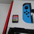 NINTENDO SWITCH CON CAJA Y JUEGO SEMINUEVA
