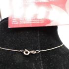 CADENA DE ORO DE 18 K CON COLGANTES