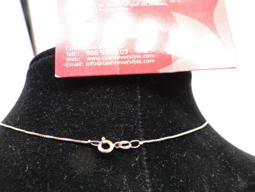 CADENA DE ORO DE 18 K CON COLGANTES