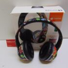 AURICULAR CON CAJA BLUETOOH PERFECTO ESTADO
