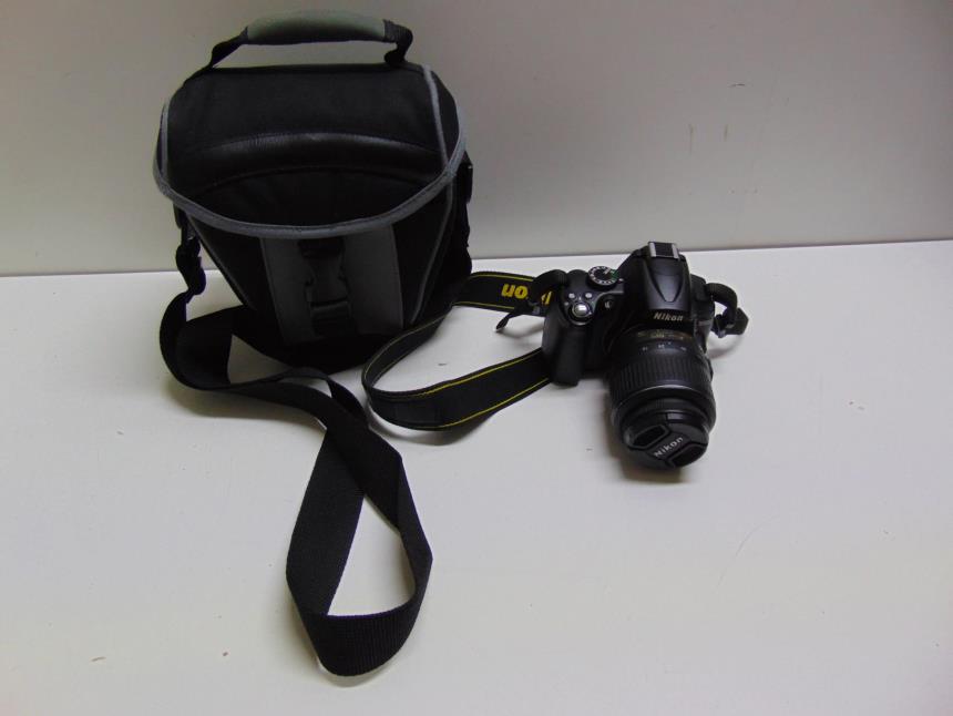 articulos_imagen1_183147-2.jpg CAMARA FOTOS CON FUNDA Y 18-55MM