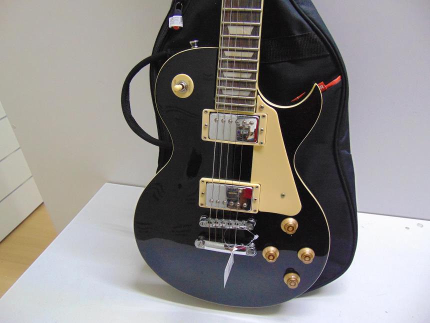 GUITARRA ELECTRICA CON FUNDA *